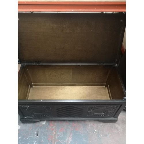 1171 - Two pieces of mid 20th century oak furniture, one sewing box with contents - approx. 58cm high x 41c... 