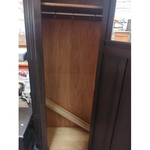 1172 - A mid 20th century oak linenfold single door wardrobe - approx. 186cm high x 79.5cm wide x 41cm deep