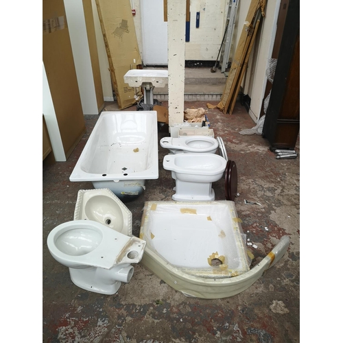 1175A - A large collection of bathroom fittings and accessories to include Vitra white porcelain toilet and ... 