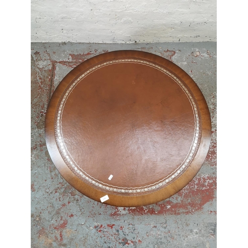 1179 - Two pieces of furniture, one Regency style mahogany circular coffee table with tan leather insert an... 