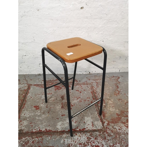 1180 - Seven Metalliform polished MDF beech and metallic traditional laboratory stools - approx. 64cm high ... 