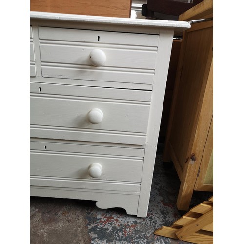 1119B - A white painted pine chest of two short over two long drawers - approx. 78cm high x 92cm wide x 48cm... 