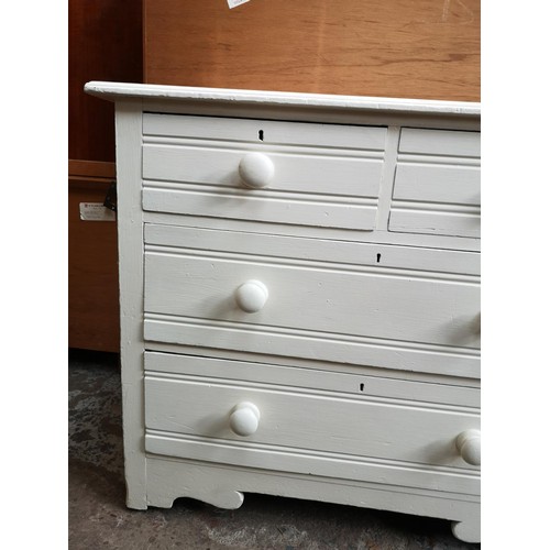 1119B - A white painted pine chest of two short over two long drawers - approx. 78cm high x 92cm wide x 48cm... 