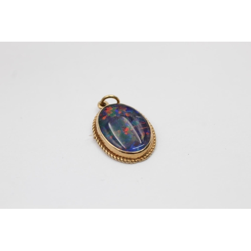 2156 - Two 9ct gold opal items, one solitaire pendant and one pair of stud earrings - approx. gross weight ... 