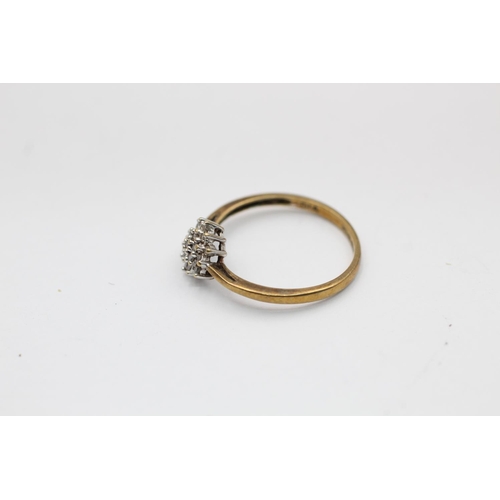 2159 - A hallmarked Sheffield 9ct gold diamond floral set ring, size O - approx. gross weight 1.4 grams