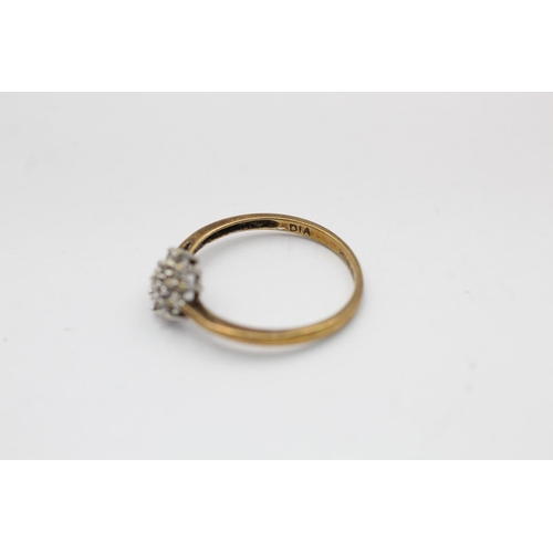 2159 - A hallmarked Sheffield 9ct gold diamond floral set ring, size O - approx. gross weight 1.4 grams