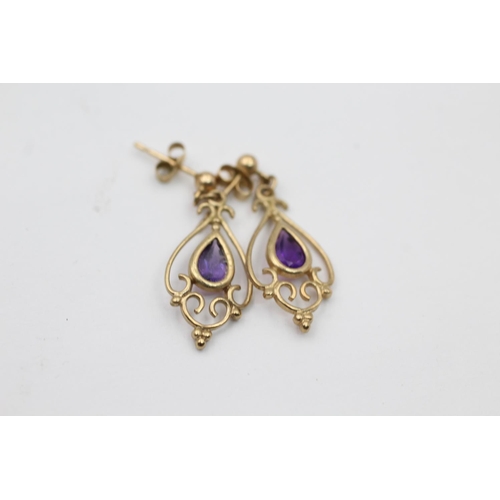 2164 - Three pairs of 9ct gold gemstone drop earrings, one garnet, one amethyst and one topaz - approx. gro... 