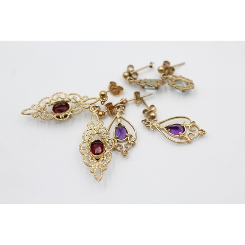 2164 - Three pairs of 9ct gold gemstone drop earrings, one garnet, one amethyst and one topaz - approx. gro... 