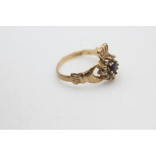 2166 - A 9ct gold sapphire and clear gemstone claddagh ring, size M½ - approx. gross weight 2.3 grams