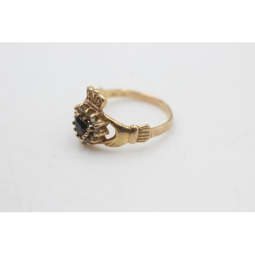 2166 - A 9ct gold sapphire and clear gemstone claddagh ring, size M½ - approx. gross weight 2.3 grams