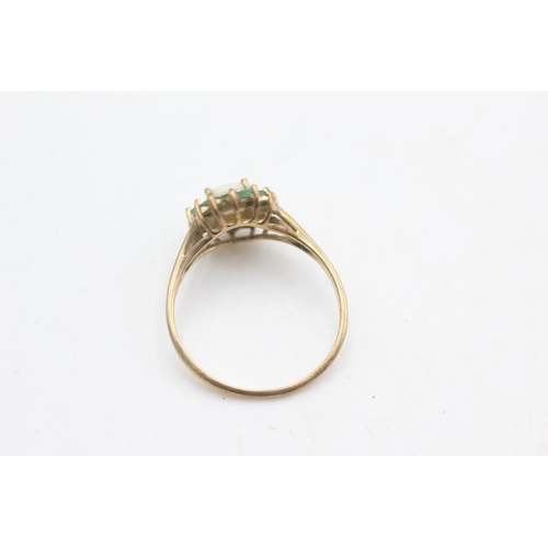 2167 - A hallmarked Birmingham 9ct gold emerald framed opal ring, size T - approx. gross weight 2.2 grams