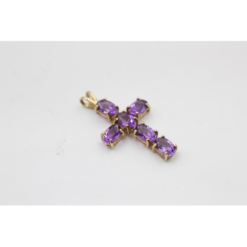 2171 - Two 9ct gold amethyst pendants. One diamond halo teardrop and one cross - approx. gross weight 4 gra... 