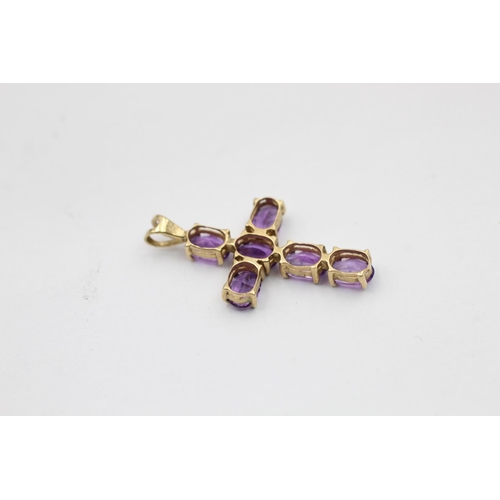 2171 - Two 9ct gold amethyst pendants. One diamond halo teardrop and one cross - approx. gross weight 4 gra... 