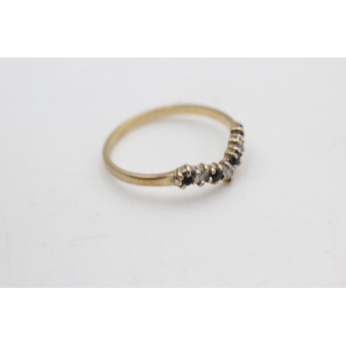 2178 - A hallmarked Birmingham 9ct gold sapphire and clear gemstone wishbone ring, size N½ - approx. gross ... 