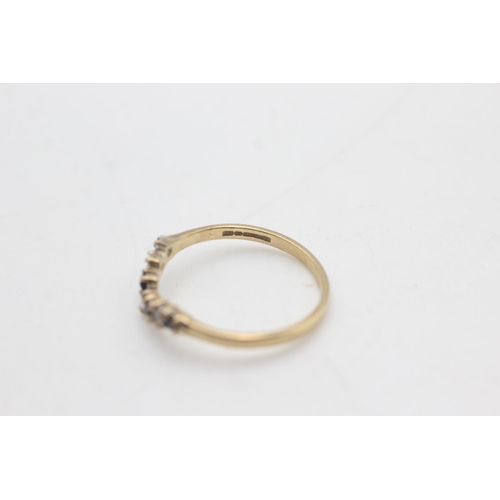 2178 - A hallmarked Birmingham 9ct gold sapphire and clear gemstone wishbone ring, size N½ - approx. gross ... 