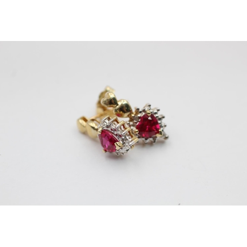 2179 - Two pairs of 9ct gold diamond and gemstone drop earrings, one amethyst and one synthetic ruby - appr... 