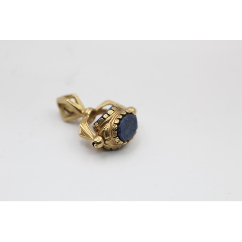 2188 - Two 9ct gold gemstone spinner fob pendants, one sodalite and one carnelian, onyx and tigers eye - ap... 