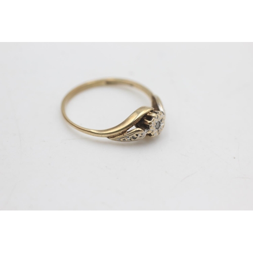 2197 - A hallmarked Birmingham 9ct gold diamond three stone stylised twist setting ring, size N - approx. g... 