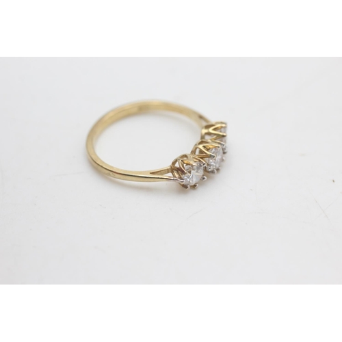 2198 - A 9ct gold clear gemstone trilogy cathedral setting ring ,size Q½ - approx. gross weight 2.2 grams