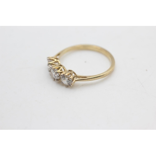 2198 - A 9ct gold clear gemstone trilogy cathedral setting ring ,size Q½ - approx. gross weight 2.2 grams