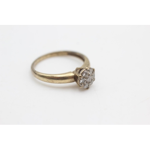 2199 - A hallmarked Birmingham 9ct gold multi diamond set ring, size M½ - approx. gross weight 2 grams