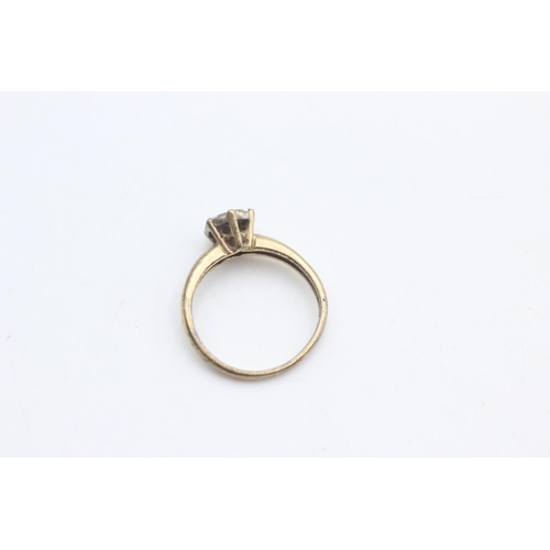 2199 - A hallmarked Birmingham 9ct gold multi diamond set ring, size M½ - approx. gross weight 2 grams