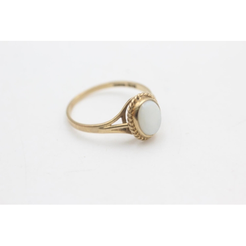 2200 - A hallmarked Birmingham 9ct gold rope framed opal solitaire ring, size P - approx. gross weight 1.6 ... 