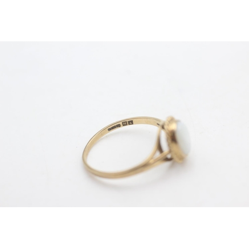 2200 - A hallmarked Birmingham 9ct gold rope framed opal solitaire ring, size P - approx. gross weight 1.6 ... 