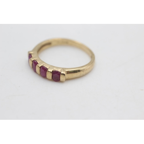 2203 - A hallmarked Birmingham 9ct gold four stone ruby fronted ring, size Q½ - approx. gross weight 3.1 gr... 