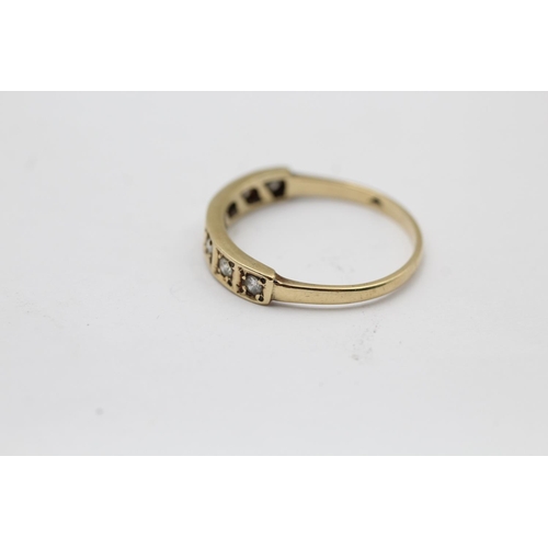 2204 - A hallmarked London 9ct gold diamond fronted band ring, size R - approx. gross weight 2 grams