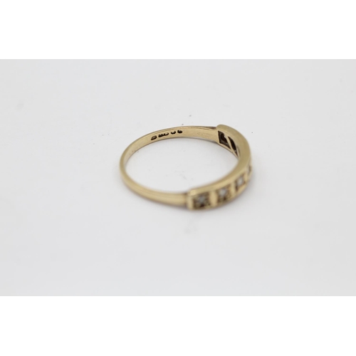 2204 - A hallmarked London 9ct gold diamond fronted band ring, size R - approx. gross weight 2 grams