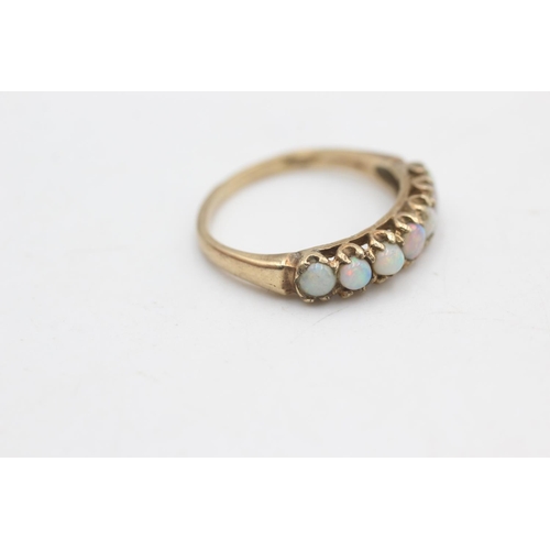 2211 - A hallmarked London 9ct gold opal half eternity ring, size O½ - approx. gross weight 2.1 grams