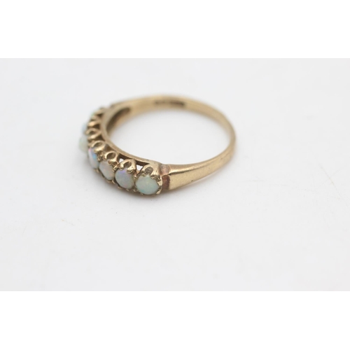 2211 - A hallmarked London 9ct gold opal half eternity ring, size O½ - approx. gross weight 2.1 grams