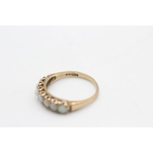 2211 - A hallmarked London 9ct gold opal half eternity ring, size O½ - approx. gross weight 2.1 grams