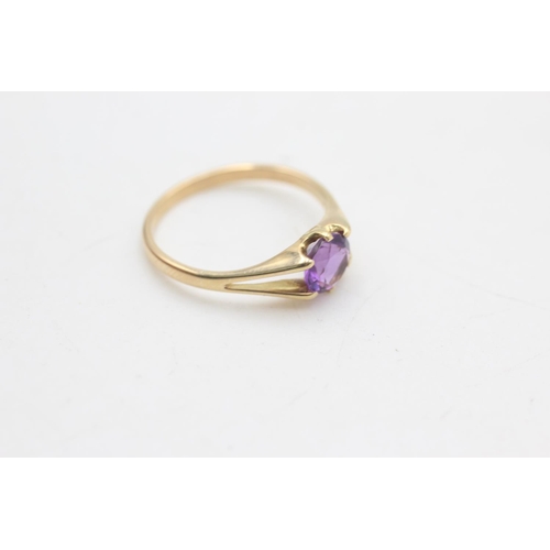 2213 - An 18ct gold amethyst solitaire ring, size N½ - approx. gross weight 2.1 grams