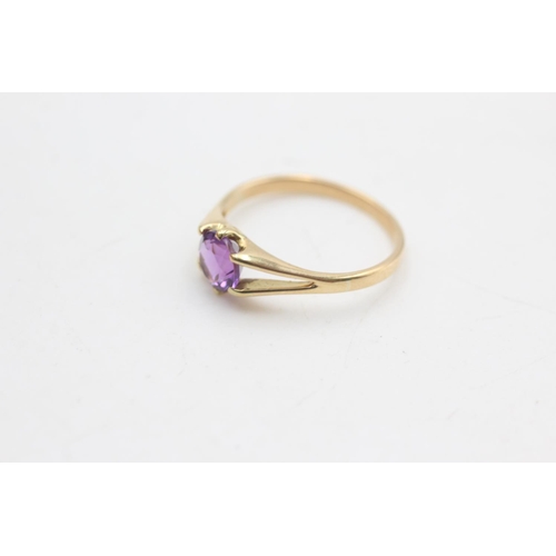 2213 - An 18ct gold amethyst solitaire ring, size N½ - approx. gross weight 2.1 grams