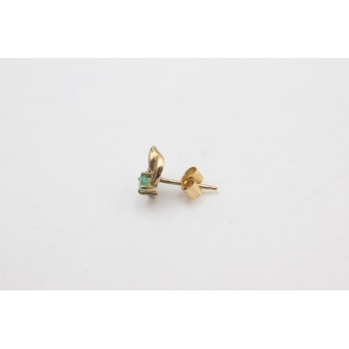 2222 - A pair of 9ct gold diamond and emerald stud earrings - approx. gross weight 0.9 grams