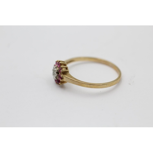 2229 - A hallmarked London 9ct gold ruby and diamond floral set ring, size R - approx. gross weight 1.6 gra... 