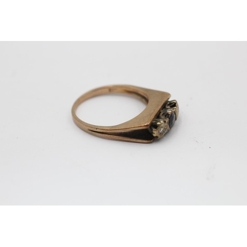 2234 - A hallmarked London 9ct gold sapphire and diamond three stone ring, size R - approx. gross weight 4.... 