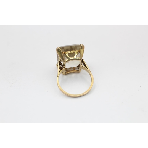 2250 - A hallmarked London 9ct gold baguette cut smoky quartz dress ring, size P - approx. gross weight 7.3... 