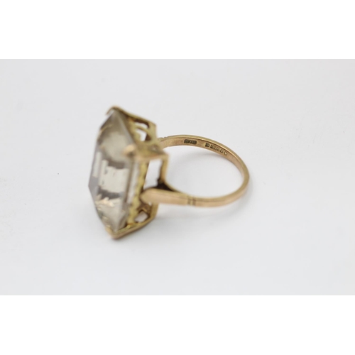 2250 - A hallmarked London 9ct gold baguette cut smoky quartz dress ring, size P - approx. gross weight 7.3... 