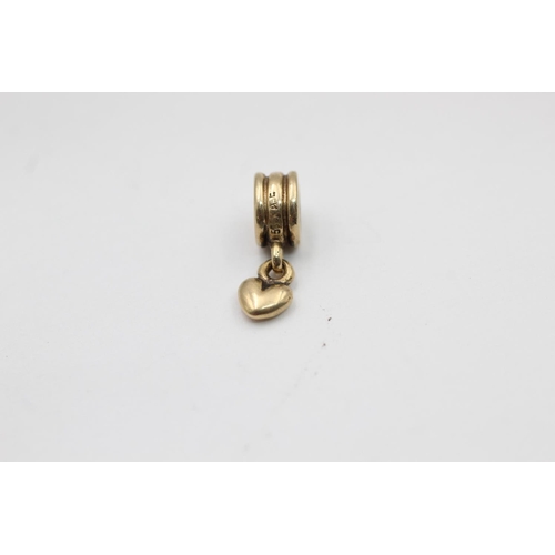 2255 - A 14ct gold Pandora spacer charm with heart drop - approx. gross weight 1.7 grams