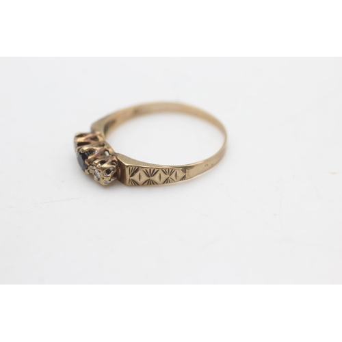 2256 - A hallmarked London 9ct gold sapphire and diamond three stone etched shoulders ring, size O½ - appro... 