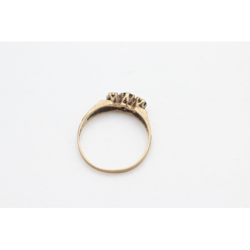 2256 - A hallmarked London 9ct gold sapphire and diamond three stone etched shoulders ring, size O½ - appro... 