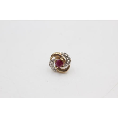 2266 - A pair of 9ct gold ruby and diamond swirl stud earrings - approx. gross weight 1.2 grams