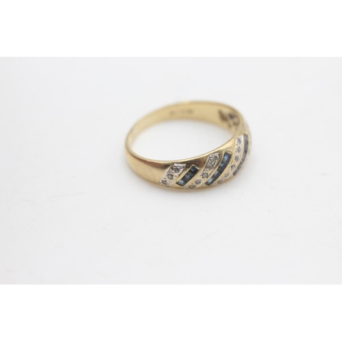 2268 - A hallmarked Sheffield 9ct gold diamond and sapphire fronted band ring, size P½ - approx. gross weig... 