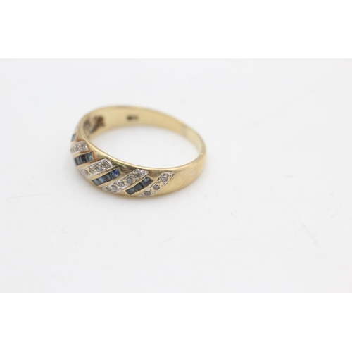 2268 - A hallmarked Sheffield 9ct gold diamond and sapphire fronted band ring, size P½ - approx. gross weig... 