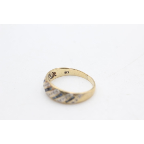 2268 - A hallmarked Sheffield 9ct gold diamond and sapphire fronted band ring, size P½ - approx. gross weig... 