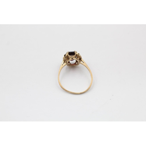 2271 - A hallmarked London 9ct gold garnet six claw set ring, size Q - approx. gross weight 2.4 grams