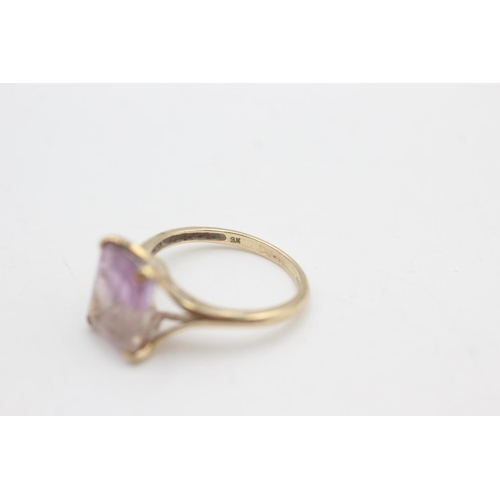 2272 - A hallmarked Birmingham 9ct gold baguette cut amethyst solitaire ring, size Q - approx. gross weight... 